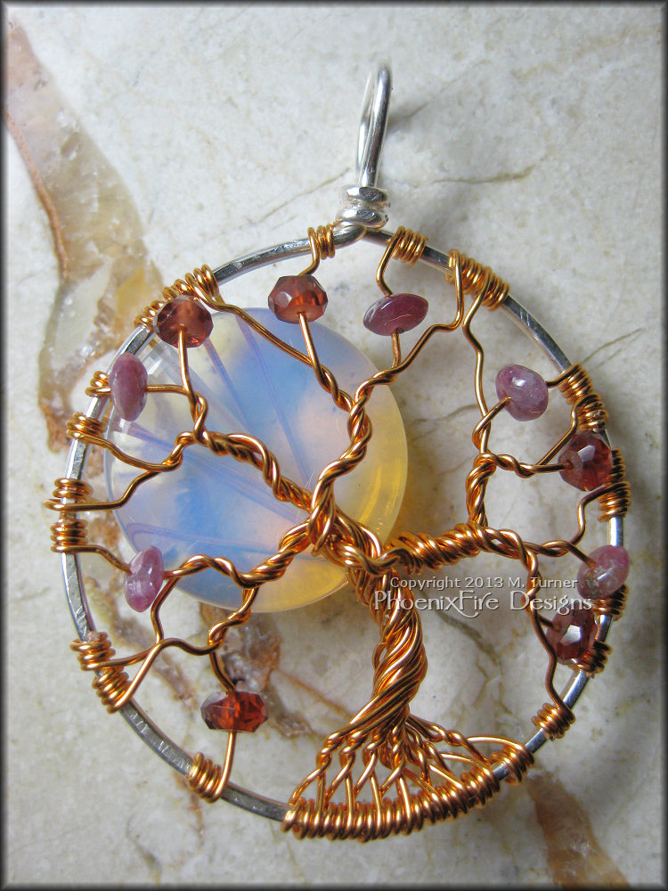 For this one, my customer requested the Opalite Moonstone Full Moon style to be in copper wire and also wanted a small scattering of a mix of pink tourmaline and garnet rondelles in the branches.