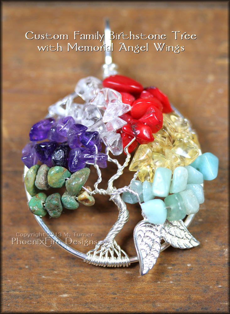 This custom family birthstone tree celebrates the birthstones of those in the family. A pair of sterling silver angel wings were added by request into the final December branches in memorial and remembrance of a child who passed.