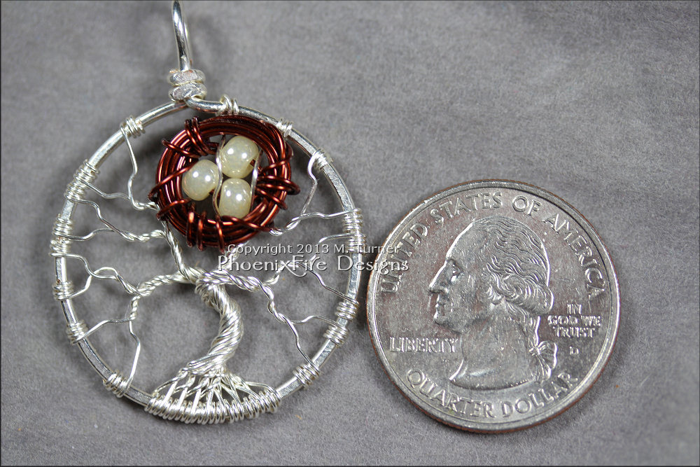 Tree of Life pendants with a small bird nest nestled in the branches of these handmade, wire wrapped sterling silver tree pendants make a unique Mother’s Tree celebrating family and children. By PhoenixFire Designs