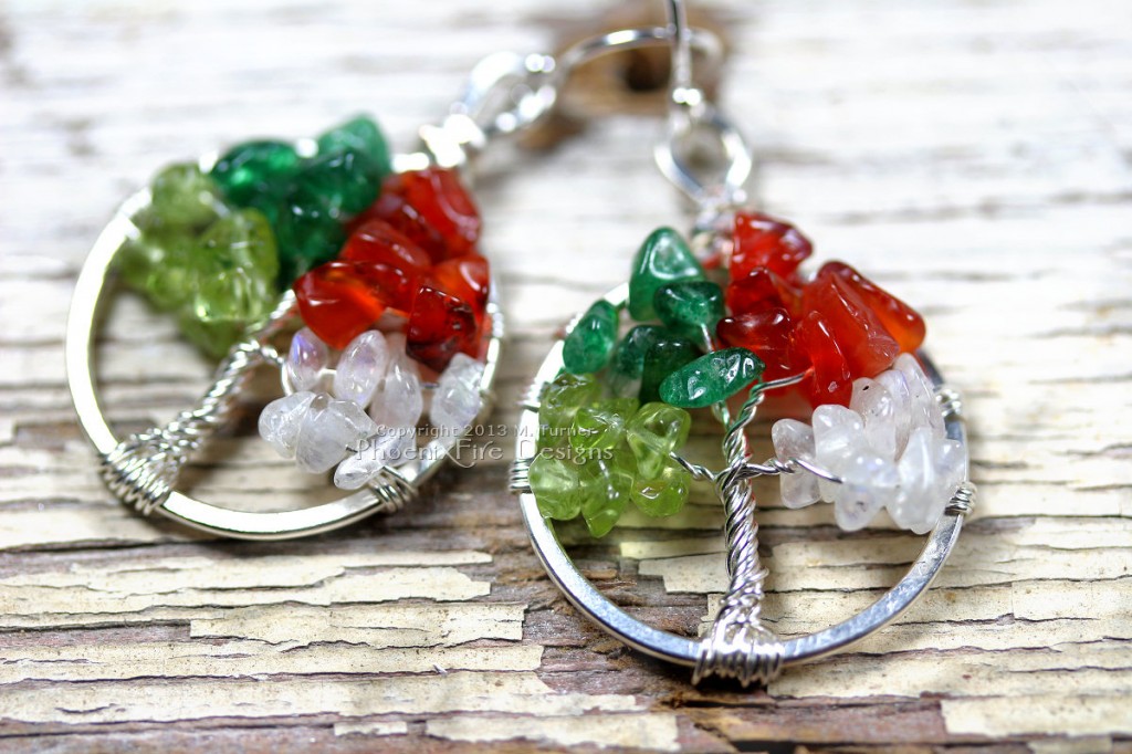 Miniature Four Season Tree of Life pendant earrings features peridot, green aventurine, red carnelian and rainbow moonstone and hang on .925 sterling silver ear wire hooks.