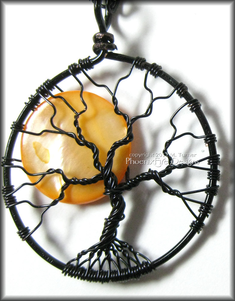 Halloween inspired Spooky Tree with bare black branches and a full moon, harvest moon in the night sky.