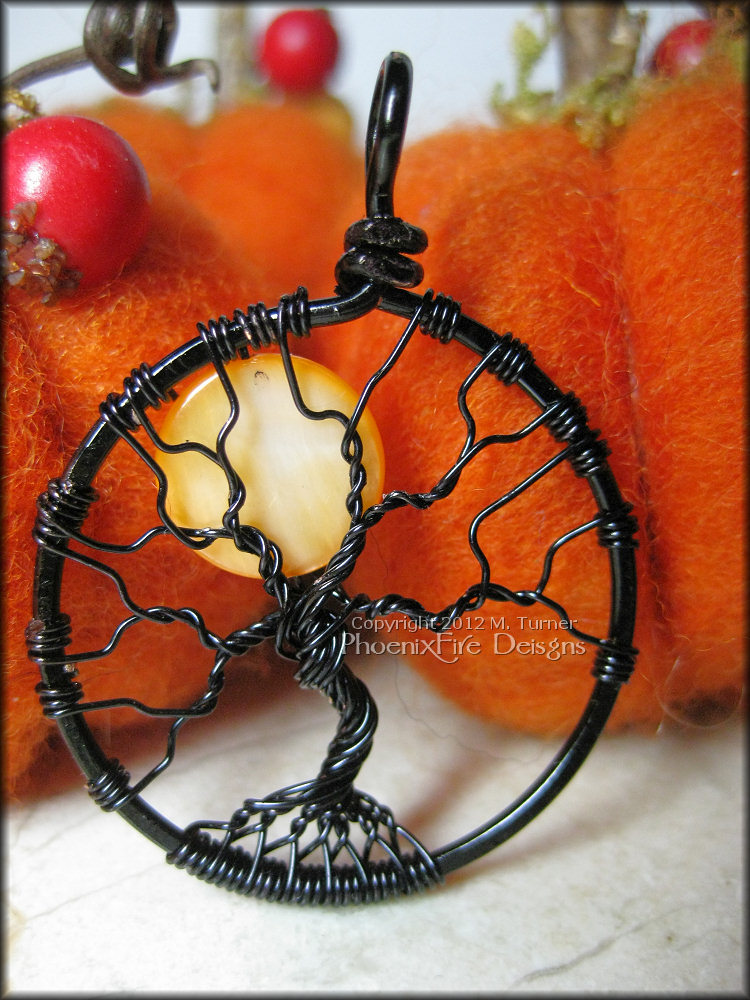 This is a smaller version of my normal Spooky Tree of Life Pendant. Bare branches in black wire under a full, orange moon.  by PhoenixFire Designs