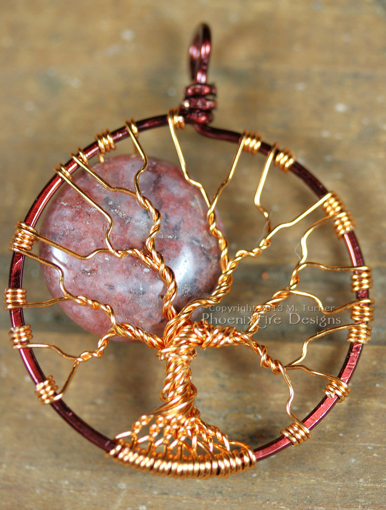 This Red Lodolite Autumn Harvest Full Moon Tree of Life pendant is wrapped in two tone brown and copper wire. Also known as Garden Quartz, Lodalite, Lodelite, and Inclusion Quartz as well.