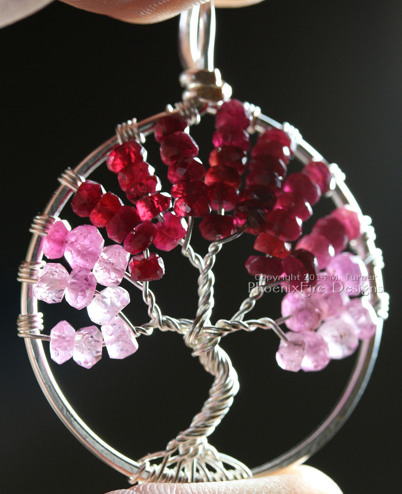 Tree of Life pendant in stunning shaded ombre red, raspberry and pink ruby rondelles wire wrapped in silver wire feature July's precious gemstone birthstone by PhoenixFire Designs.