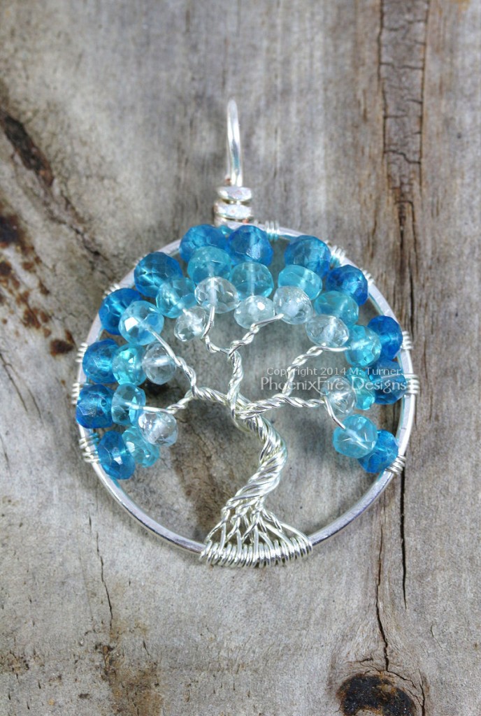 Tricolor Caribbean blue tree of life pendant handcrafted wire wrapped in silver with aquamarine, apatite and london blue mystic topaz faceted rondelle gemstones by Miss M. Turner of Phoenix Fire Designs and available on etsy.