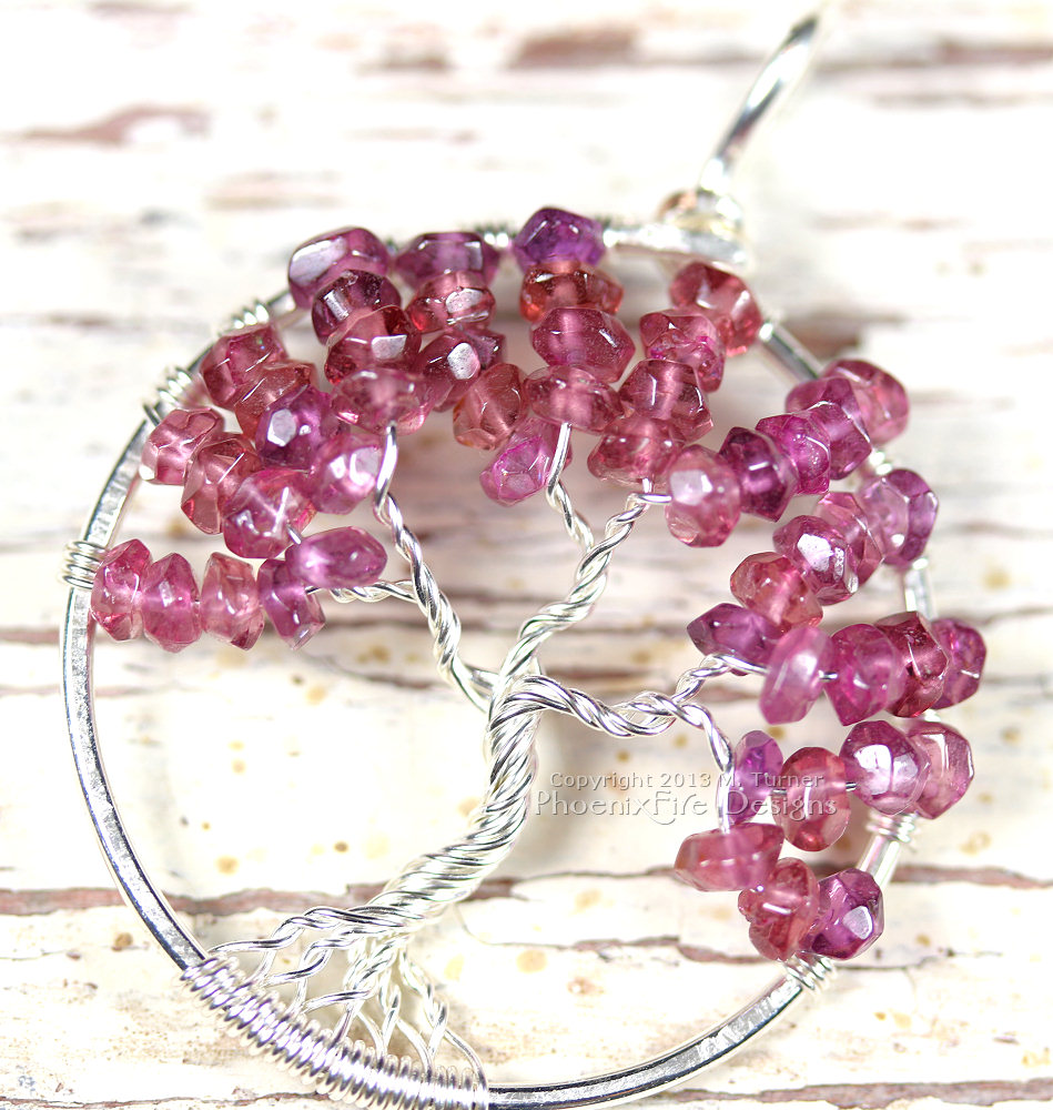 Rhodolite Garnet Tree of Life Pendant in a raspberry color, one of the many color variations of January's birthstone.