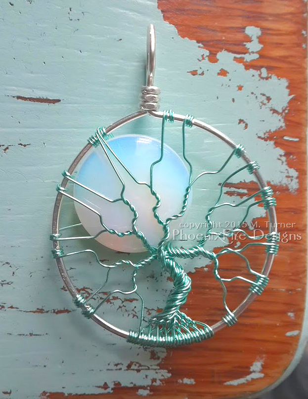 Beachy, nautical jewelry, aqua wire wrapped tree of life pendant with an opalite rainbow moonstone full moon makes me think of the beach and sunny summer days at the shore.