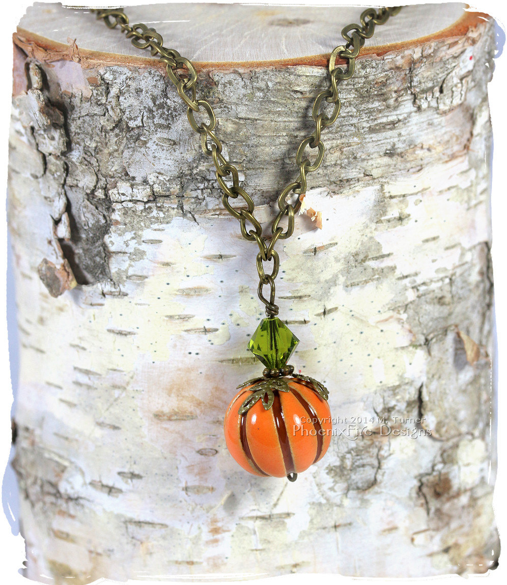 Handmade pumpkin necklace with green Swarovski crystal accent, Halloween, Harvest, Thanksgiving inspired jewelry by PhoenixFire Designs.