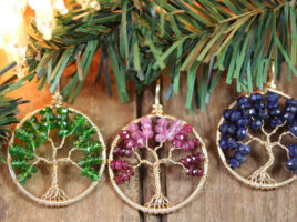 Three 14k gf Tree of Life Pendants handmade by PhoenixFire Designs featuring emerald green Chrome Diopside, an Ombre of shaded Ruby, and deep Blue Sapphire.