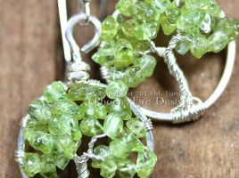 This pair of dainty Tree of Life earrings features genuine, natural Peridot gemstones and hangs on .925 sterling silver French ear wire hooks. Artisan original jewelry handmade by Miss M. Turner of PhoenixFire Designs