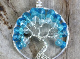 Tricolor Caribbean blue tree of life pendant handcrafted wire wrapped in silver with aquamarine, apatite and london blue mystic topaz faceted rondelle gemstones by Miss M. Turner of Phoenix Fire Designs and available on etsy.
