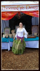Handcrafted gemstone jewelry and wire wrapped tree of life pendants by PhoenixFire Designs craft show booth display at the Bay Area Renaissance Festival March 2015