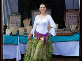 Handcrafted gemstone jewelry and wire wrapped tree of life pendants by PhoenixFire Designs craft show booth display at the Bay Area Renaissance Festival March 2015