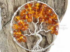 Handmade wire wrapped tree of life pendant in Baltic Amber autumn leaves silver wire wrap tree by Phoenix Fire Designs on etsy.