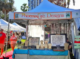 PhoenixFire Designs handmade, wire wrapped jewelry tree of life pendant necklaces, celestial jewelry and more vendor booth at Shopapalooza Festival south straub park downtown st petersburg. Shop small, shop local!