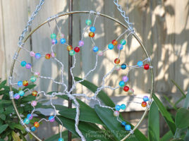 Handmade, wire wrapped tree of life suncatcher with rainbow cracked glass beads, garden art, forest wall art, decorative housewarming gift handmade by PhoenixFire Designs. on etsy.